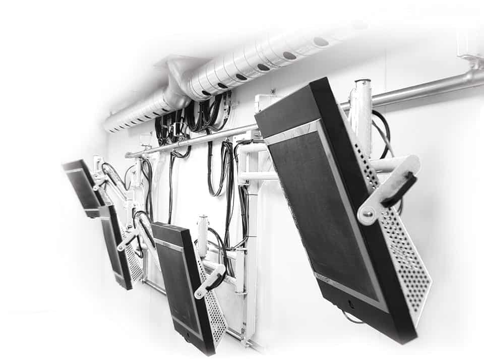 Sun-Spot catalytic infrared heaters powered off on articulated arms and overhead rail